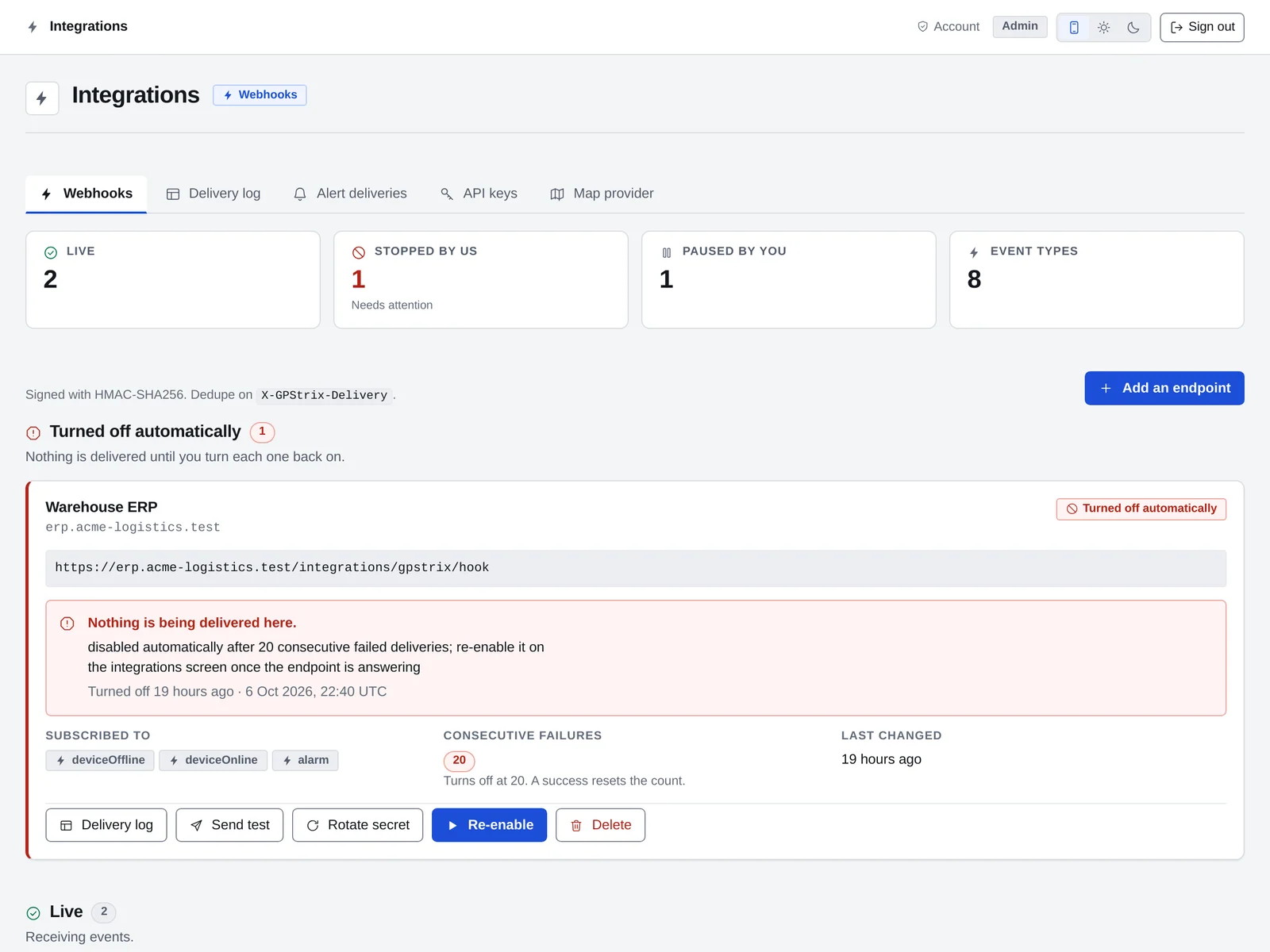The integrations screen: two live webhook endpoints, one turned off by GPStrix after 20 consecutive failed deliveries with a button to re-enable it, and one paused.